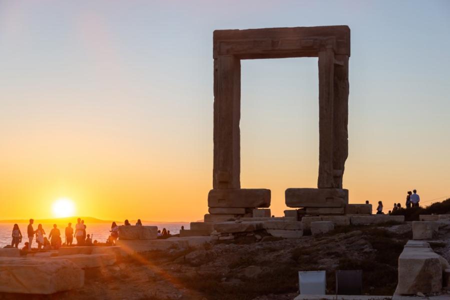 A couple enjoying the sunset at the Temple of Apollo in Naxos